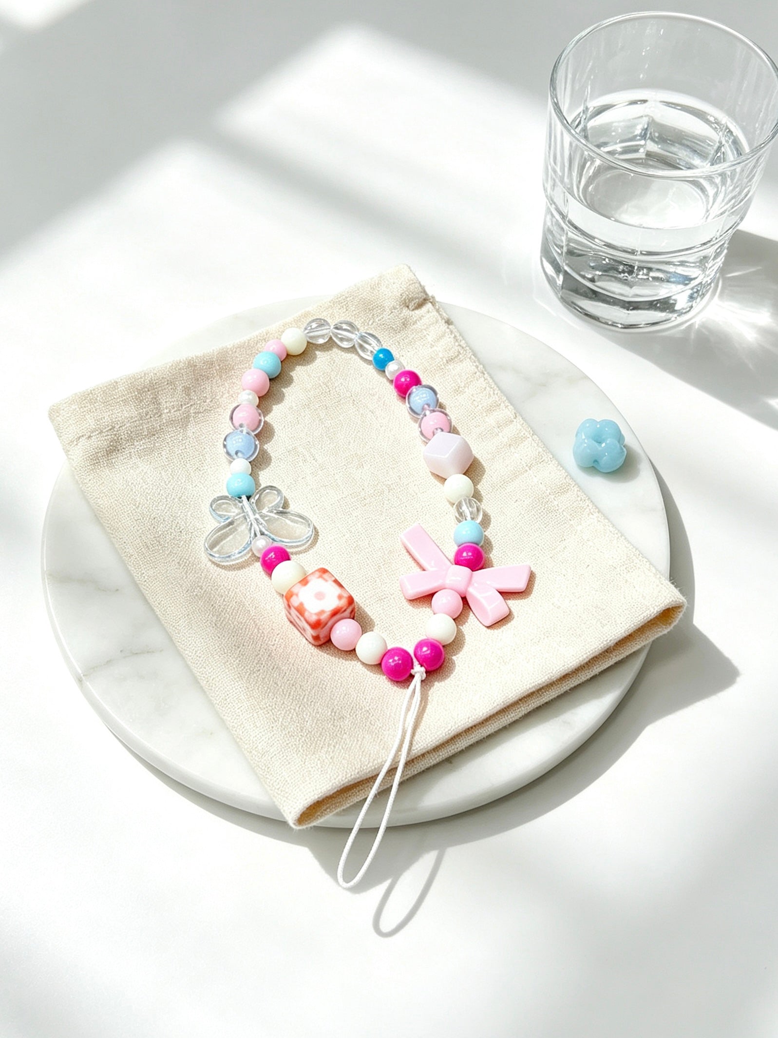 Butterfly charm phone strap with handmade bead design