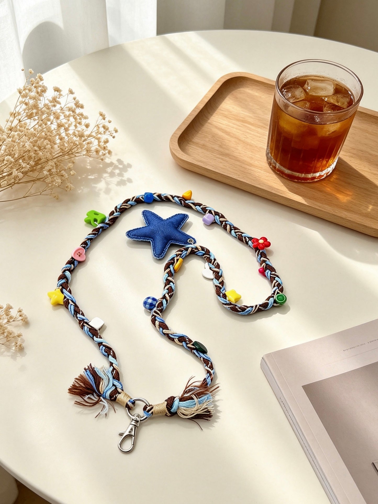 Handmade bead star phone strap with decorative charm