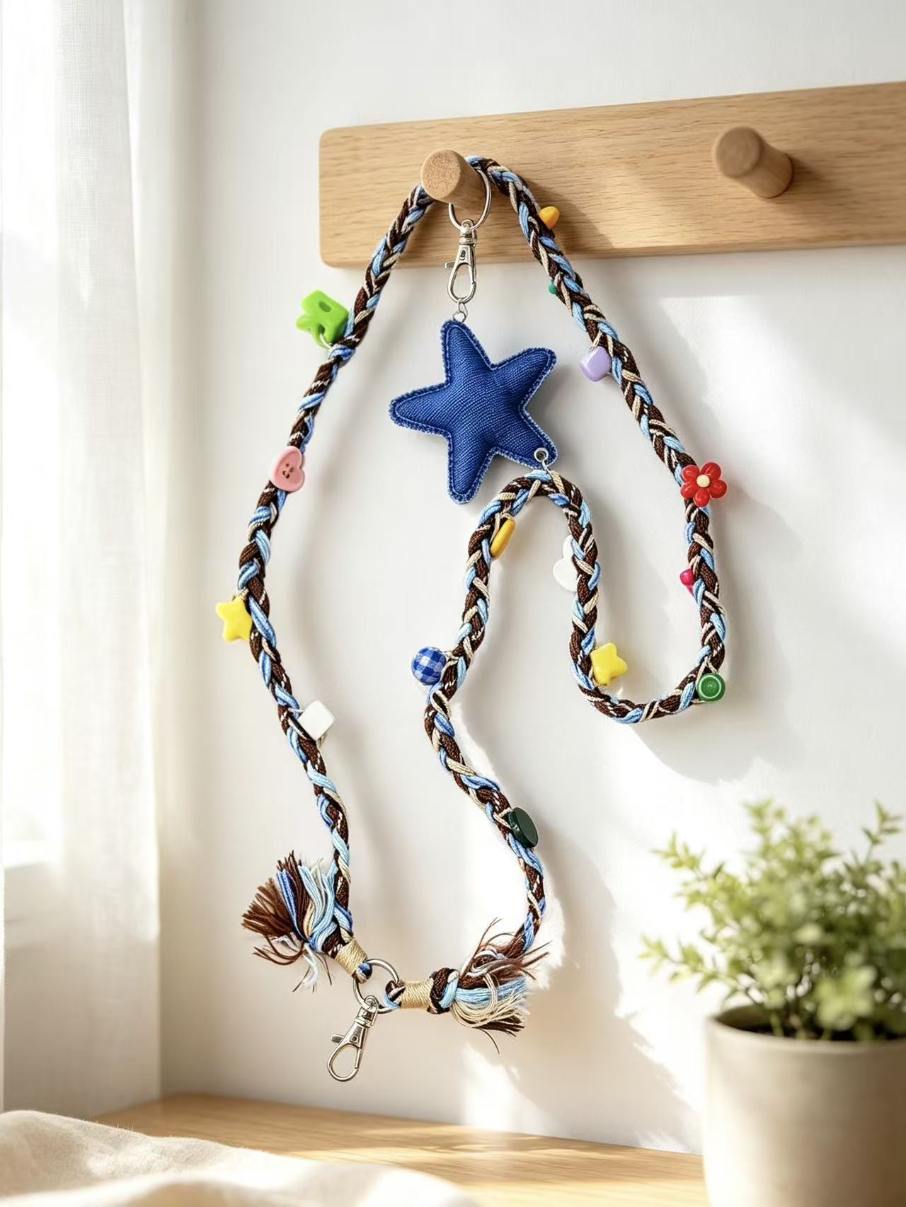 Close-up detail of five-point star phone strap accessory
